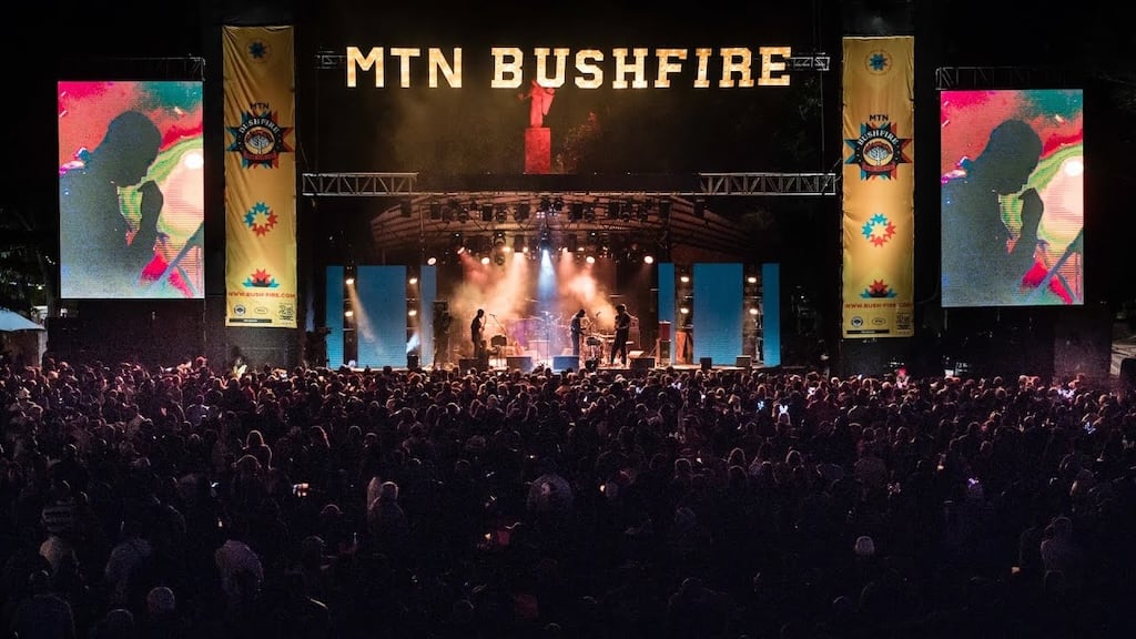 Colorful performers and dancers on the main stage at MTN Bushfire Festival